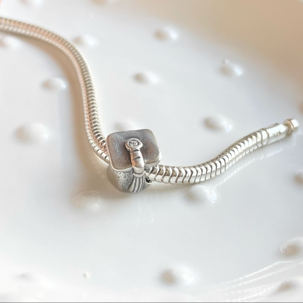 michael anthony graduation cap silver charm